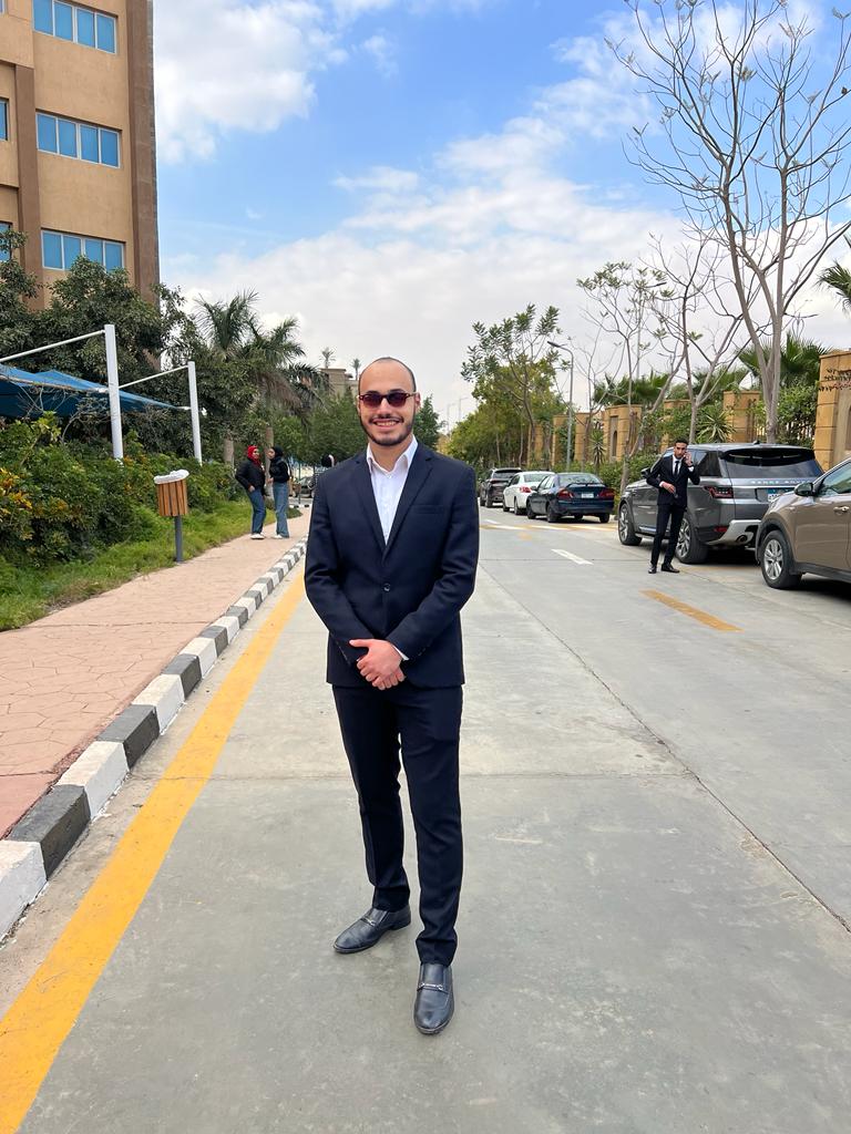 Mohamed Ebrahim wearing a dark suit outdoors